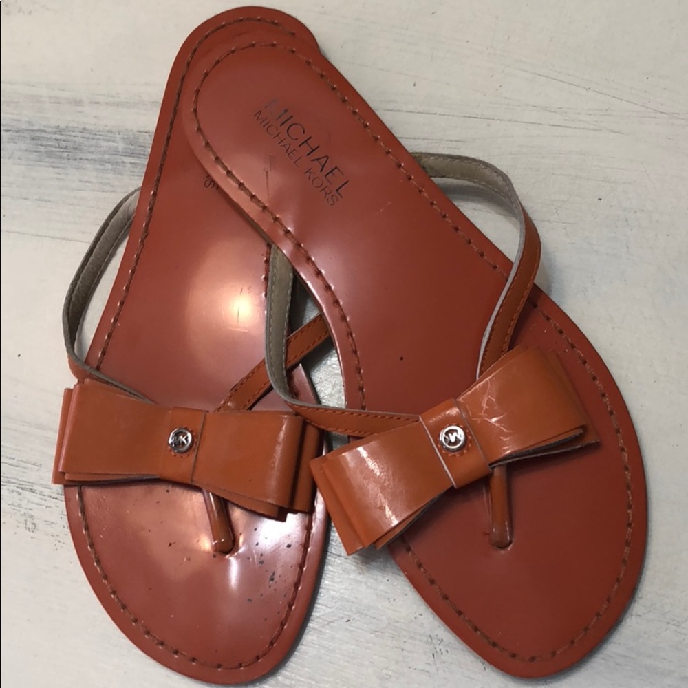 Michael Kors deep orange filp flops
